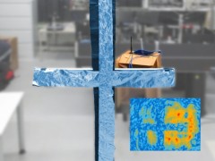 A cross made of aluminum foil between the viewer and the WLAN-router can easily be reconstructed from the WLAN-hologram as can be seen in the inserted picture. Image: Friedemann Reinhard/Philipp Holl / TUM